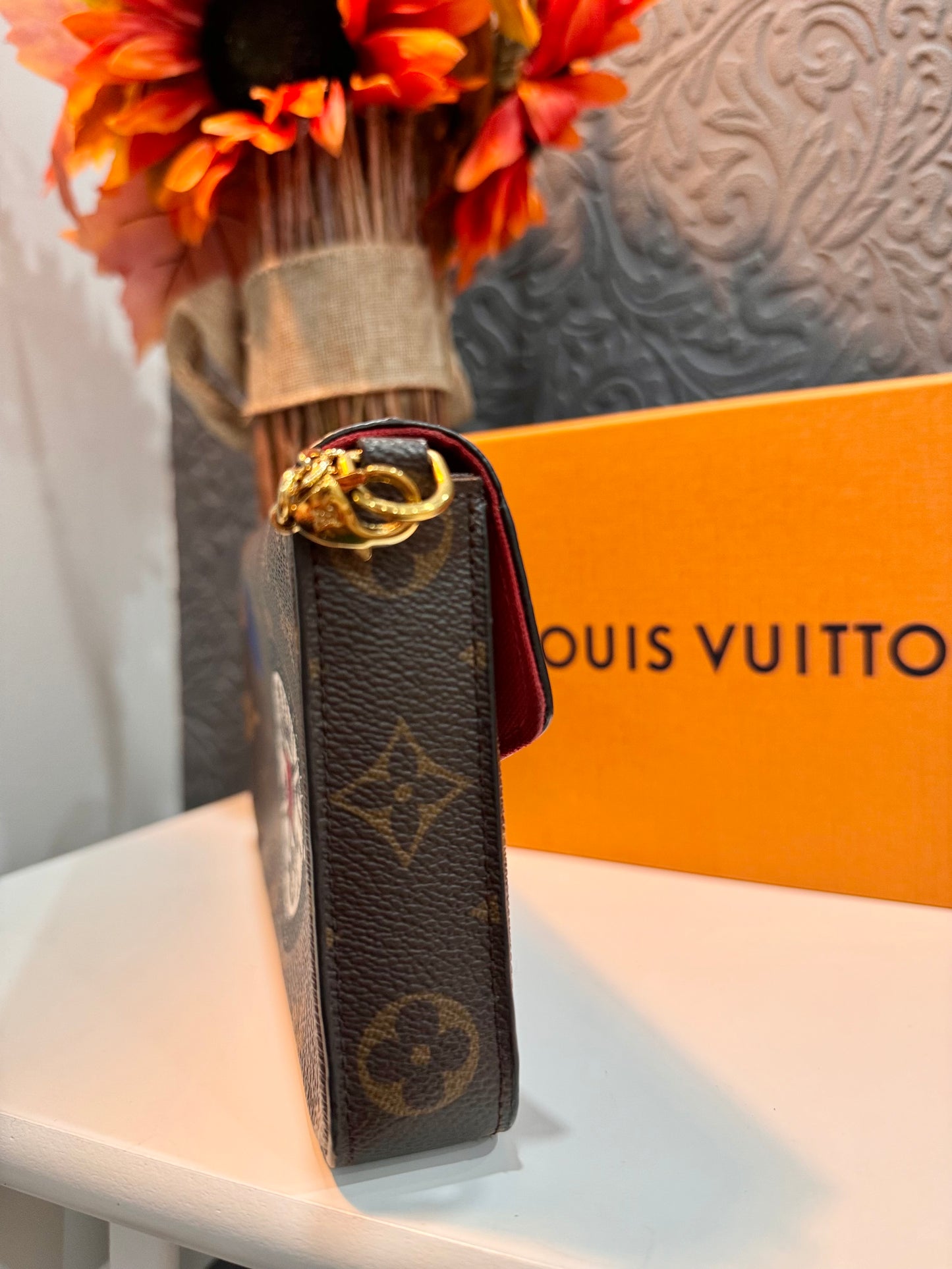 LOUIS VUITTON LIMITED EDITION WORLD TOUR FELICIE POCHETTE IN MONOGRAM CANVAS.