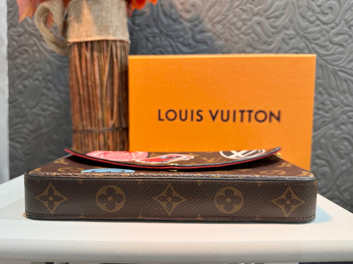 LOUIS VUITTON LIMITED EDITION WORLD TOUR FELICIE POCHETTE IN MONOGRAM CANVAS.